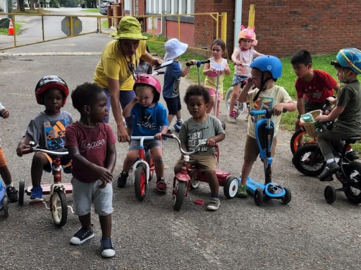 two kids take cares at MIA Learning Center 